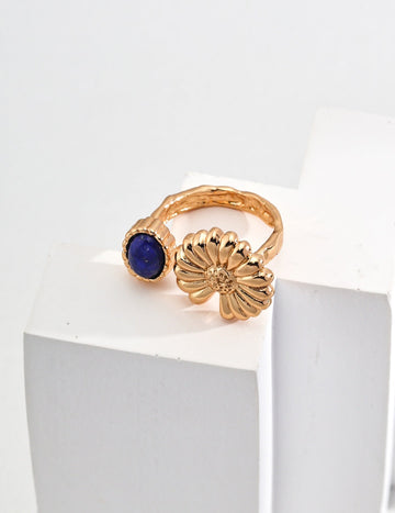 The Blue and Chry Ring featuring chrysanthemum flower and blue gemstone design.