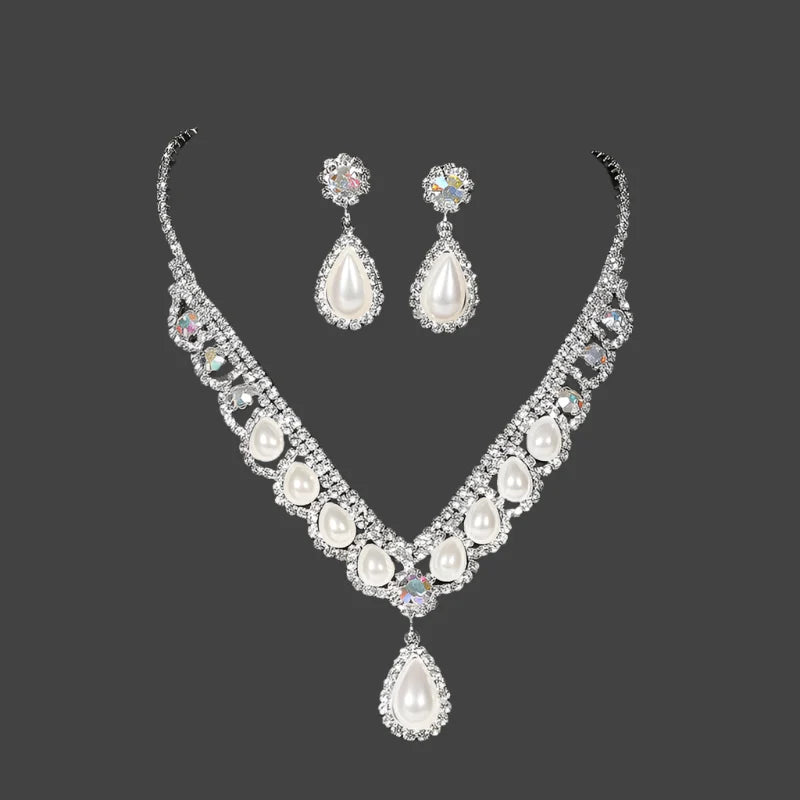 Camelia Pearl Droplet Bridal Set with pearls and crystals.