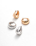 Alla Hoop Earrings in gold and silver, stylish and elegant design for everyday wear.