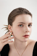 Emerald Earrings with timeless, elegant design for versatile style.