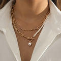 Sarah Interlocking Pearl Necklace with stacked design and elegant pearls.